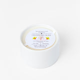 Candle with a label on a white background