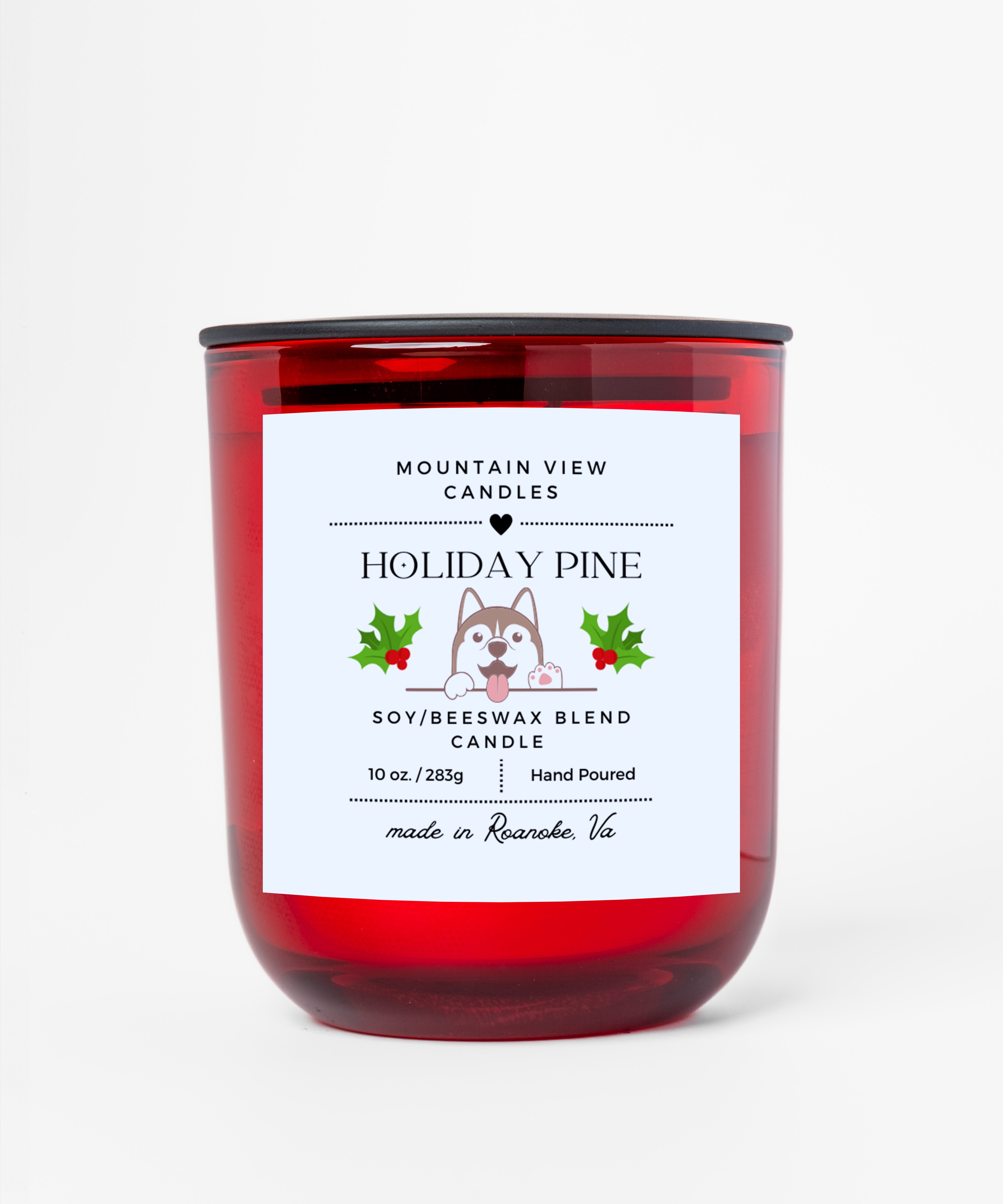 Red candle with a label on a white background