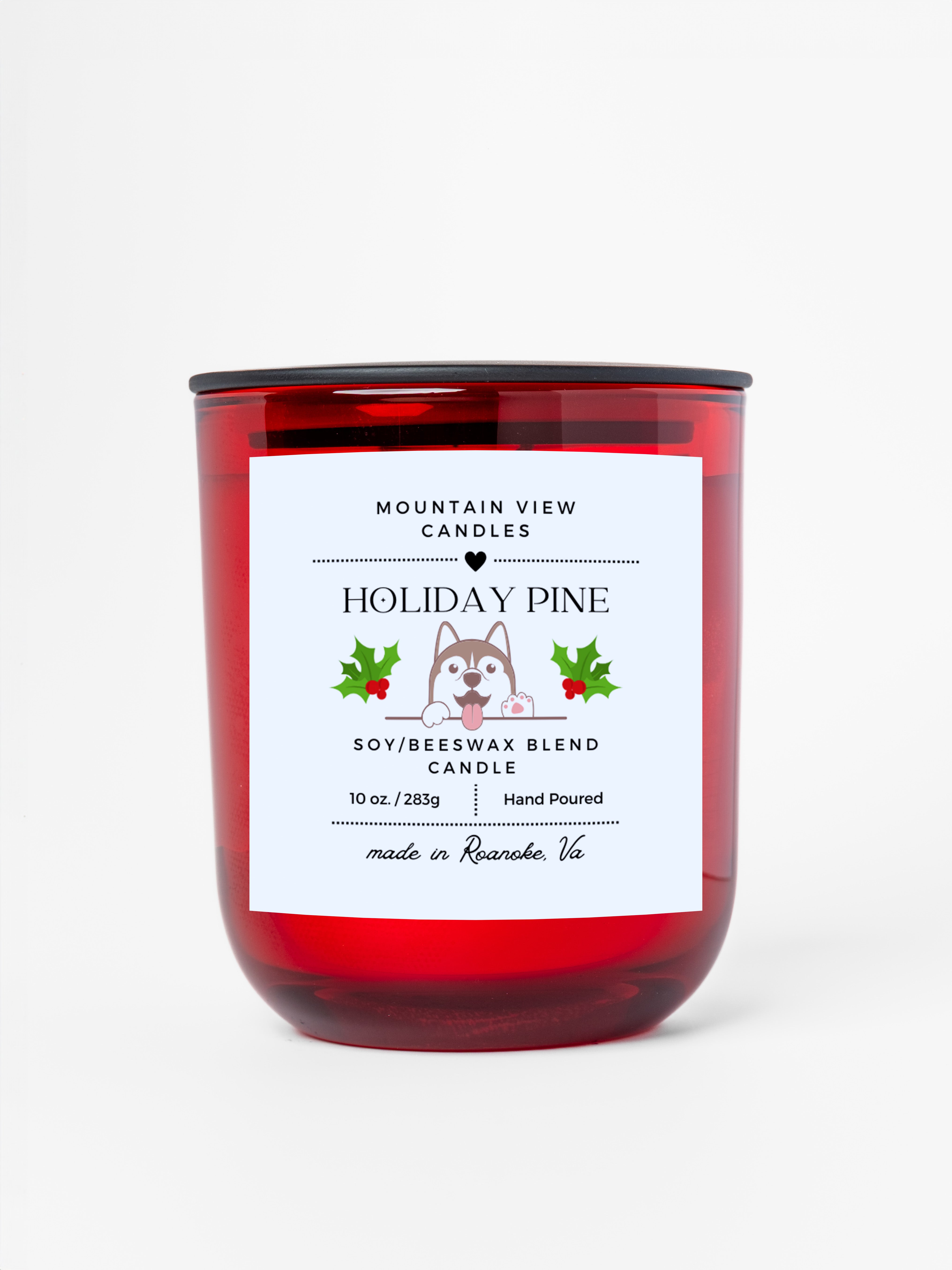 Red candle with a label on a white background