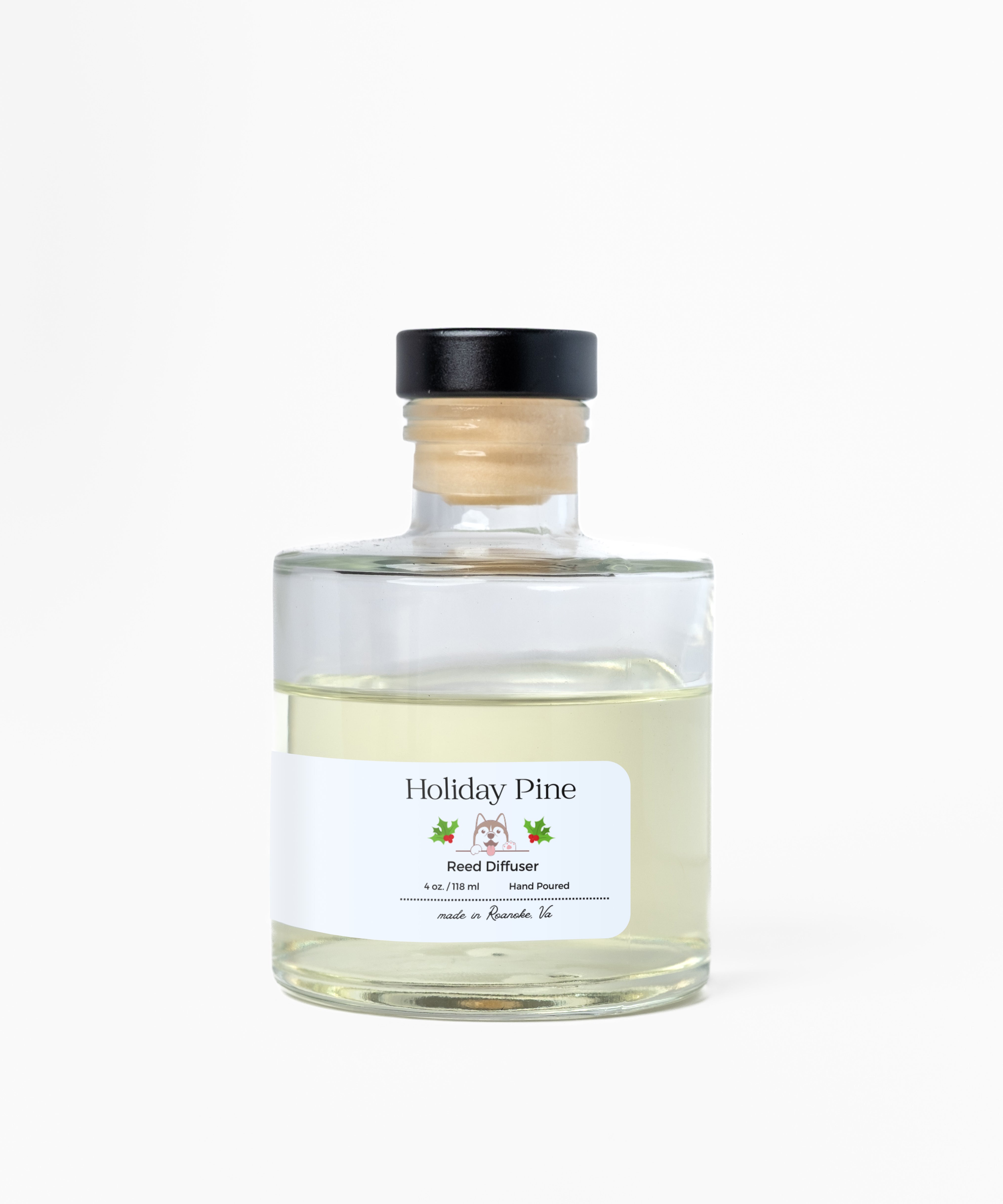 Bottle of 'Holiday Pine' diffuser on a white background