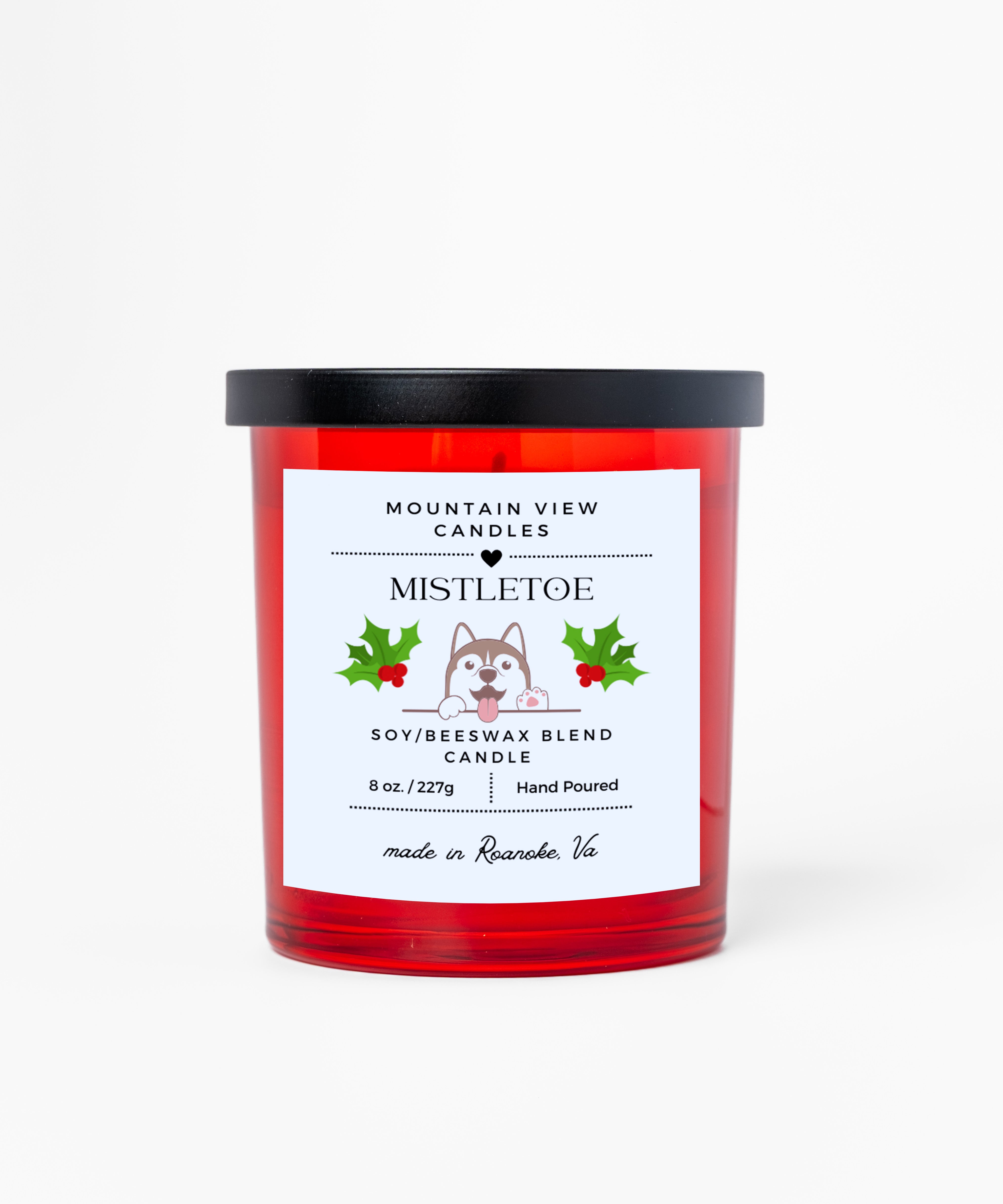 Red candle with a white label featuring a dog illustration and text on a white background