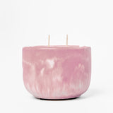 Mulberry marbled candle with two wicks on a white background