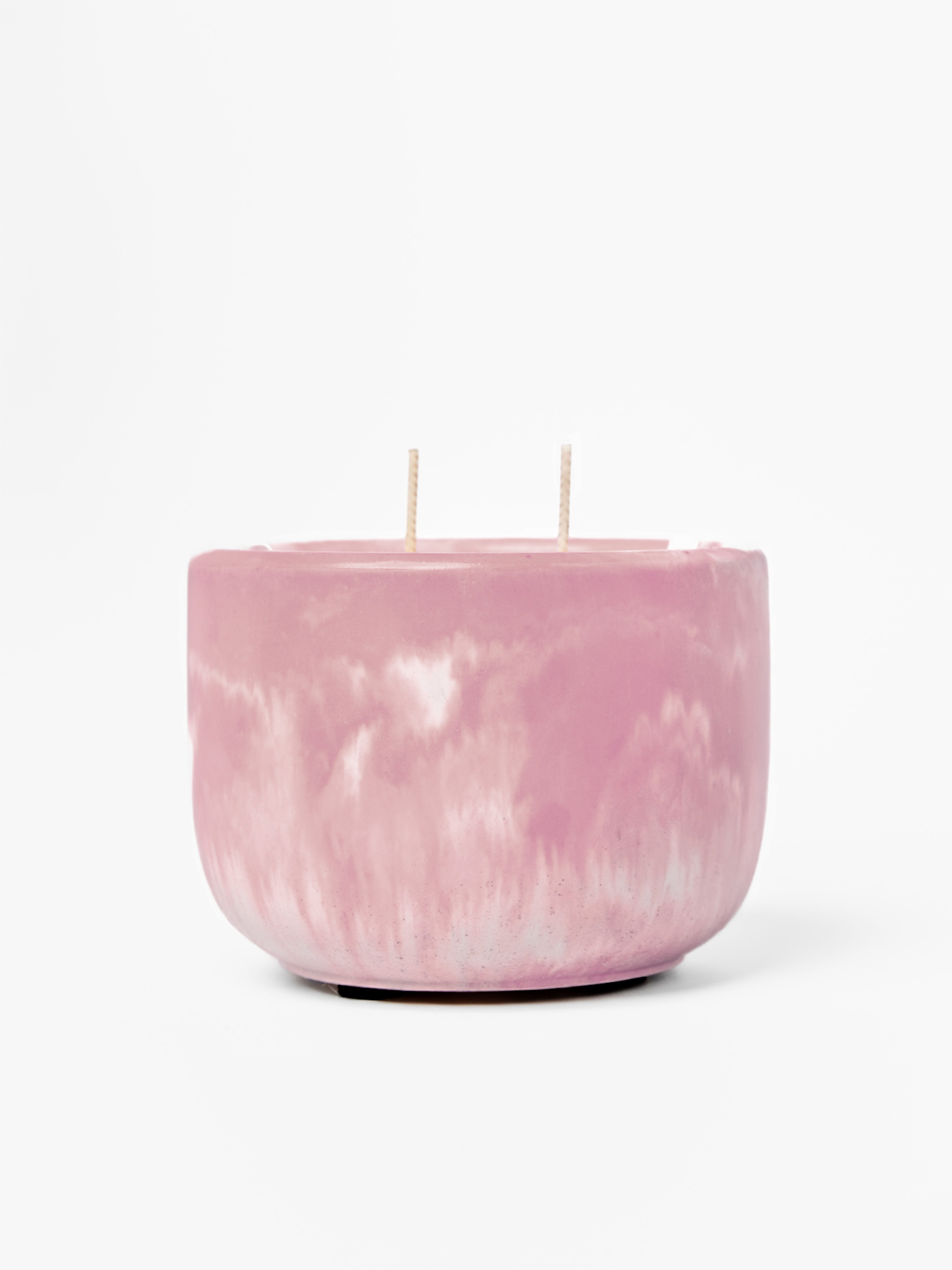 Mulberry marbled candle with two wicks on a white background