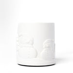 White ceramic vase on a white background