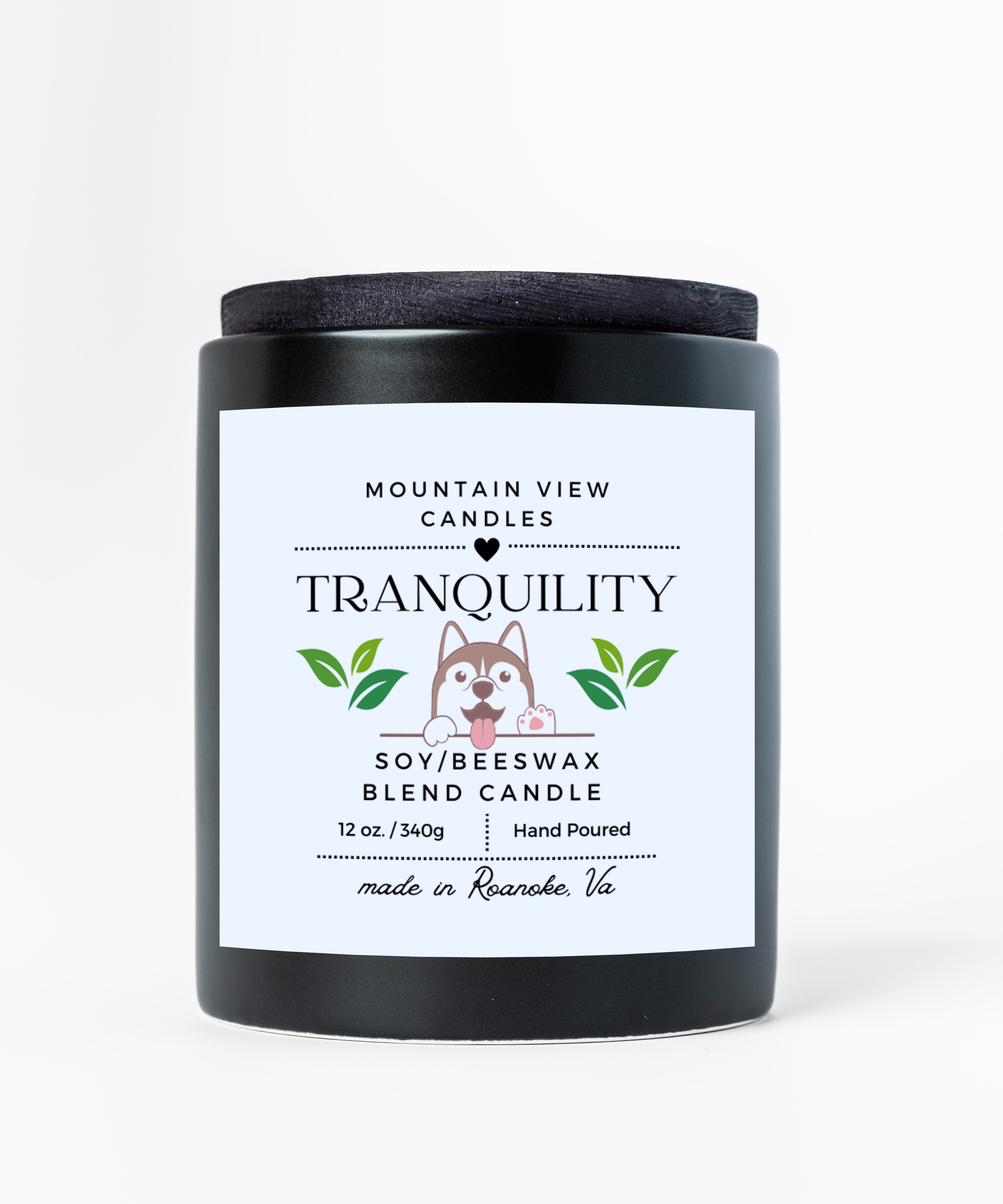 Candle with 'Tranquility' label on a white background