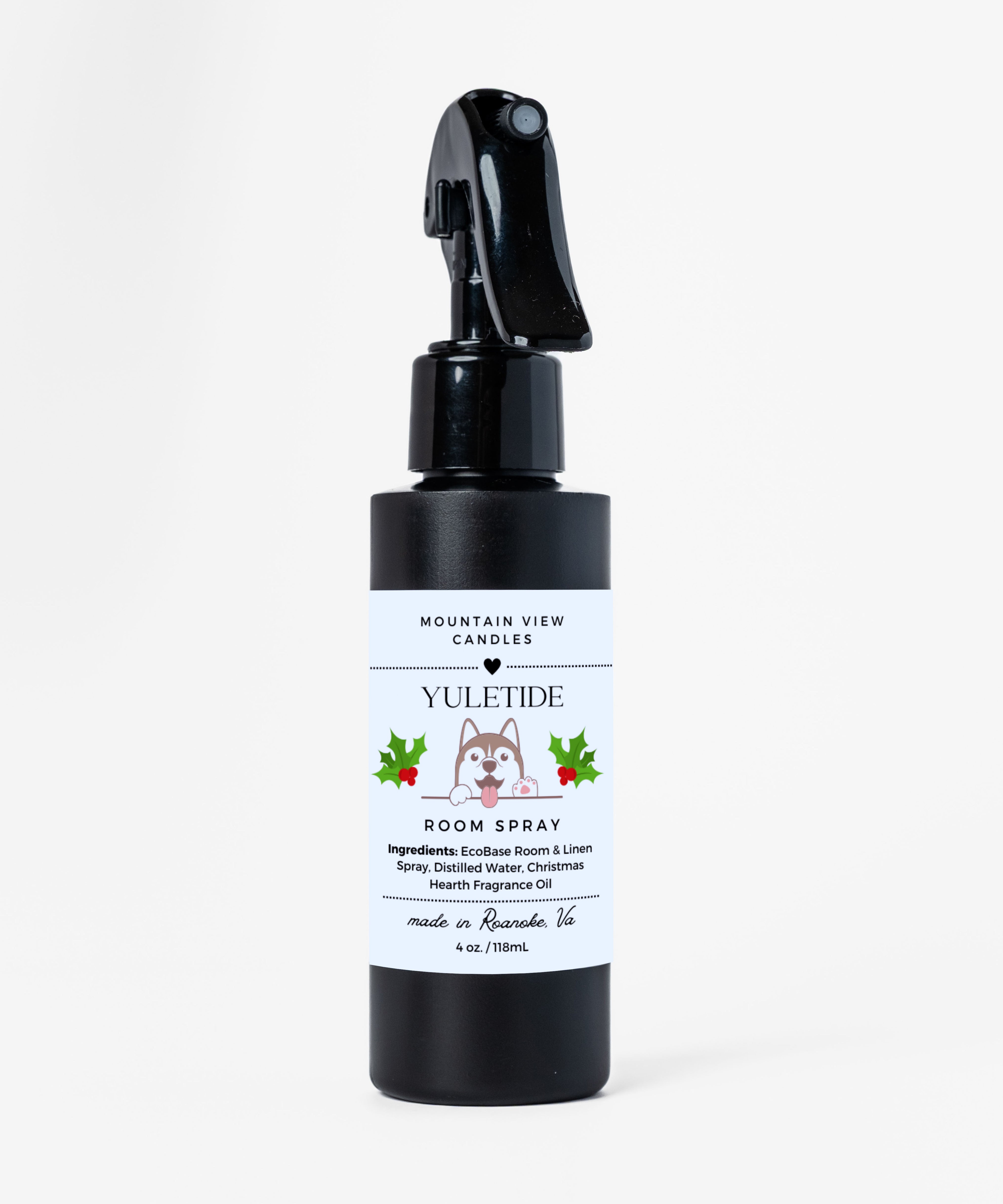 Black room spray bottle with a label on a white background